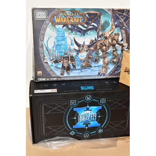 717 - TWO BOXES CONTAINING A QUANTITY OF BLIZZARD MERCHANDISE, including two unopened boxes of Blizzcon 20... 