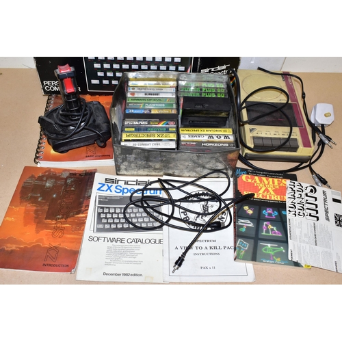 734 - ZX SPECTRUM 16K BOXED WITH A QUANTITY OF GAMES, games include Spectral Panic, Select 1: A Collection... 