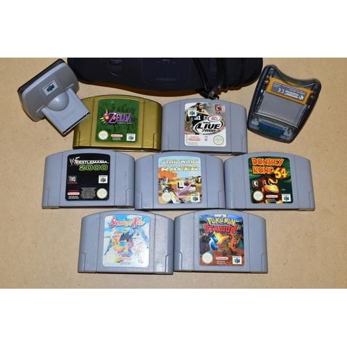 774 - N64 CONSOLE, EXPANSION PAK, TRANSFER PAKS AND GAMES, games include Pokemon Stadium, Legend of Zelda ... 