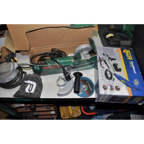 1057 - A BOSCH PHG 520 HEAT GUN and PWS600 ANGLE GRINDER, a Powercraft 1/4 sheet sander and PKW160 Combi to... 