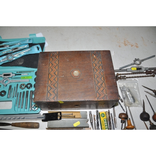 1074 - A COLLECTION OF TOOLS including miniature woodworking chisels, two screw pin drills, a miniature anv... 