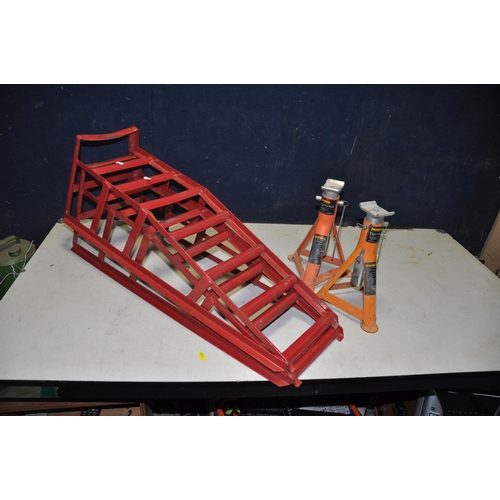 1093 - A PAIR OF HILKA 2 TONNE CAR RAMPS and a pair of Halfords axle stands (4)