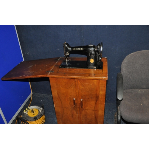 1106 - A VINTAGE SINGER SEWING MACHINE CABINET with electric Singer sewing machine fitted (PAT fail due to ... 