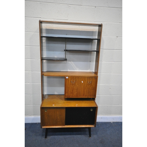 1201 - A MID CENTURY G PLAN TOLA AND BLACK ROOM DIVIDER BOOKCASE, with four sized shelves, a fall front doo... 