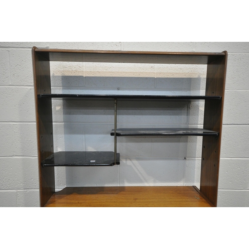 1201 - A MID CENTURY G PLAN TOLA AND BLACK ROOM DIVIDER BOOKCASE, with four sized shelves, a fall front doo... 