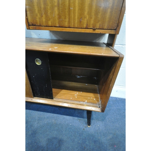 1201 - A MID CENTURY G PLAN TOLA AND BLACK ROOM DIVIDER BOOKCASE, with four sized shelves, a fall front doo... 