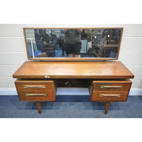 1204 - A MID CENTURY G PLAN FRESCO TEAK DRESSING TABLE, with a large rectangular mirror, a central slide, t... 