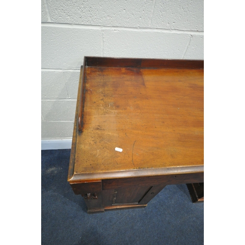 1207 - A VICTORIAN MAHOGANY PEDESTAL SIDEBOARD, with a slight raised back, two drawers, above two cupboard ... 