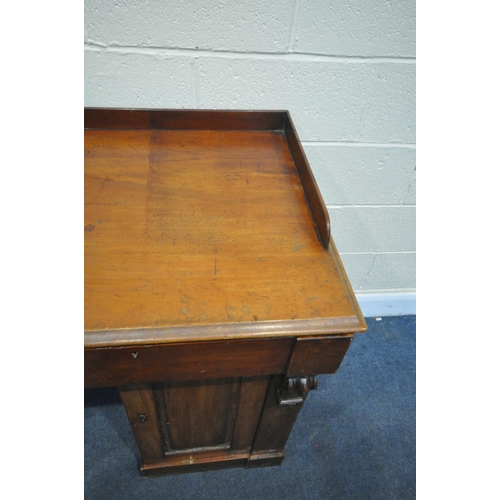 1207 - A VICTORIAN MAHOGANY PEDESTAL SIDEBOARD, with a slight raised back, two drawers, above two cupboard ... 