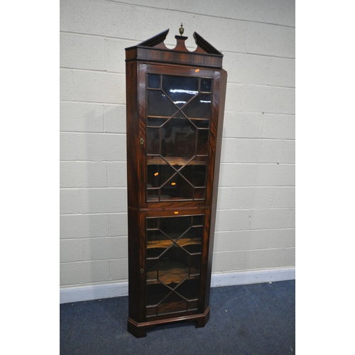 1213 - AN EARLY 20TH CENTURY MAHOGANY CORNER CUPBOARD, with two astragal glazed doors, on bracket feet, wid... 