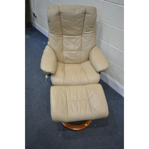 1222 - A STRESSLESS EKORNES CREAM LEATHER RECLINING ARMCHAIR, width 78cm, along with a matching footstool (... 