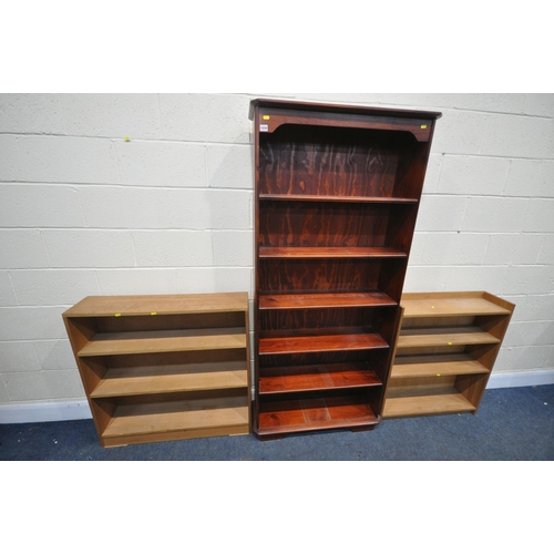 1234 - A TALL SLIM STAINED PINE OPEN BOOKCASE, with five fixed shelves, width 82cm x depth 28cm x height 18... 