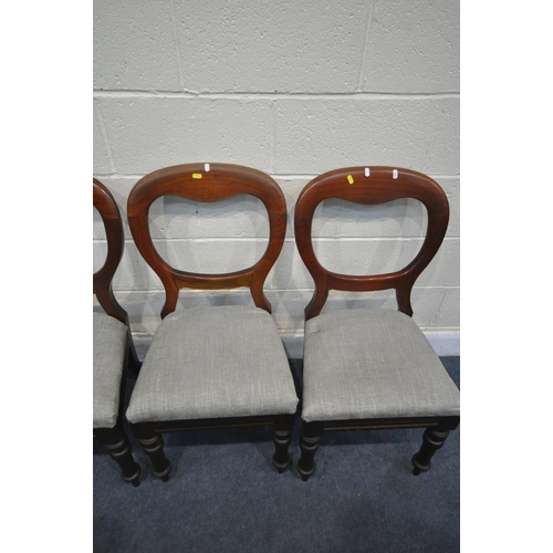 1240 - A SET OF FOUR VICTORIAN MAHOGANY BALLOON BACK CHAIRS, with grey upholstered seat pads, on turned and... 