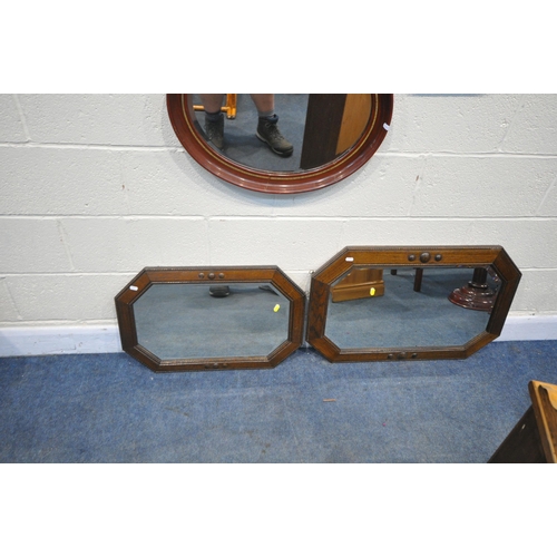 1243 - FIVE VARIOUS WALL MIRRORS, comprising four sized oak octagonal wall mirrors, largest 80cm x 52cm, an... 