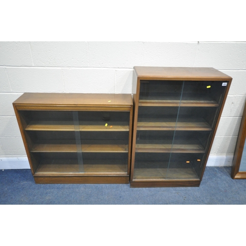 1252 - TWO 20TH CENTURY KEAN AND SCOTT OAK BOOKCASES, with two glass sliding doors, tallest width 69cm x de... 