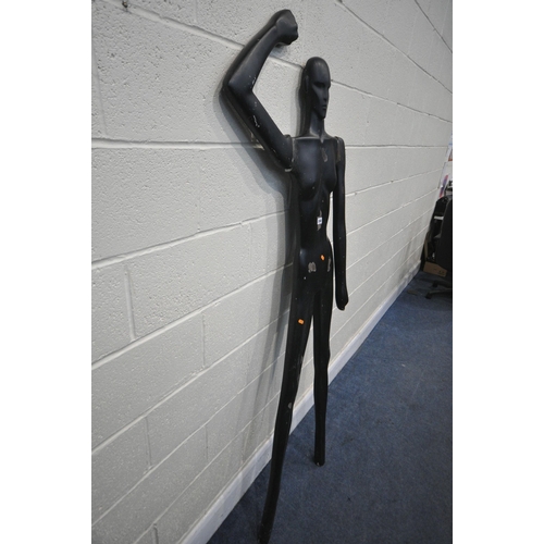 1268 - A RESIN WALL MOUNTED SHOP DISPLAY, with removable arms, height 188cm (condition - rusted fixings, di... 