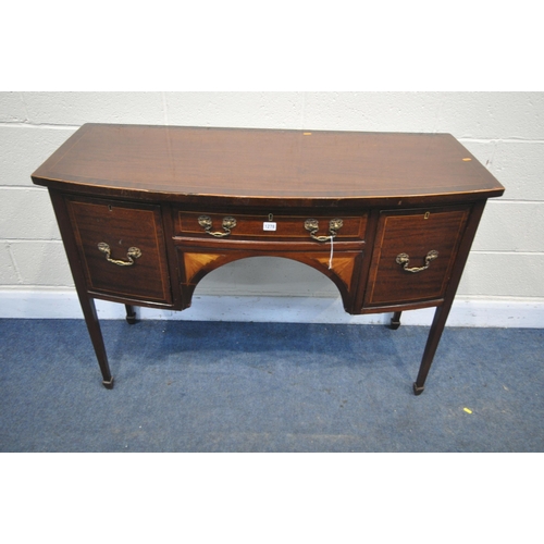 1278 - AN EDWARDIAN MAHOGANY AND INLAID BOW FRONT DESK, with three various drawers, on square tapering legs... 