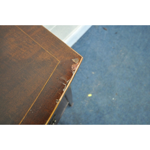 1278 - AN EDWARDIAN MAHOGANY AND INLAID BOW FRONT DESK, with three various drawers, on square tapering legs... 