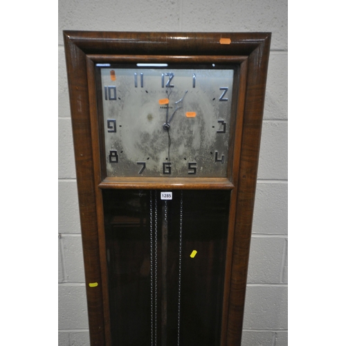 1285 - AN ART DECO FRENCH WALNUT CHIMING LONGCASE  CLOCK, with a silvered dial, signed Vedette, height 196c... 