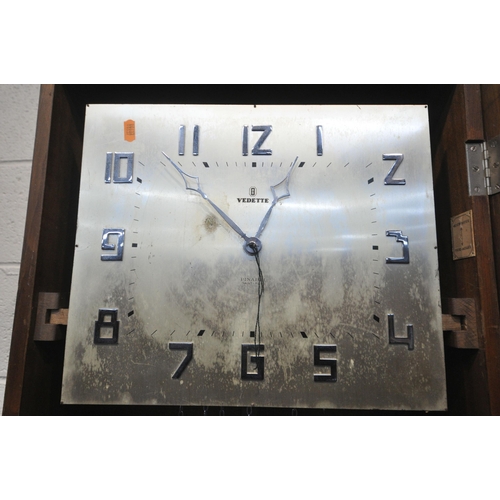 1285 - AN ART DECO FRENCH WALNUT CHIMING LONGCASE  CLOCK, with a silvered dial, signed Vedette, height 196c... 