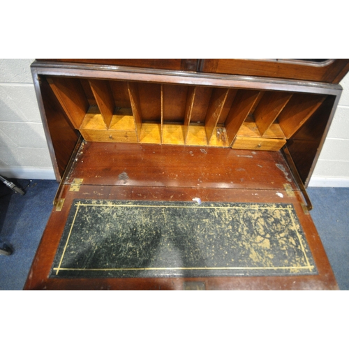 1293 - AN EARLY 20TH CENTURY MAHOGANY BUREAU BOOKCASE, the domed top with two glazed doors, enclosing three... 