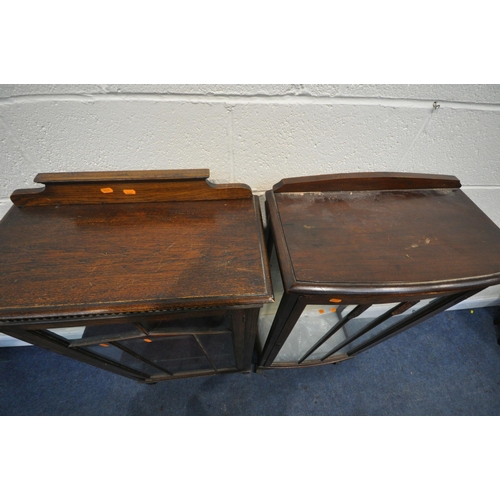 1296 - A 20TH CENTURY OAK SINGLE DOOR DISPLAY CABINET, with a raised back, the glazed door enclosing two sh... 