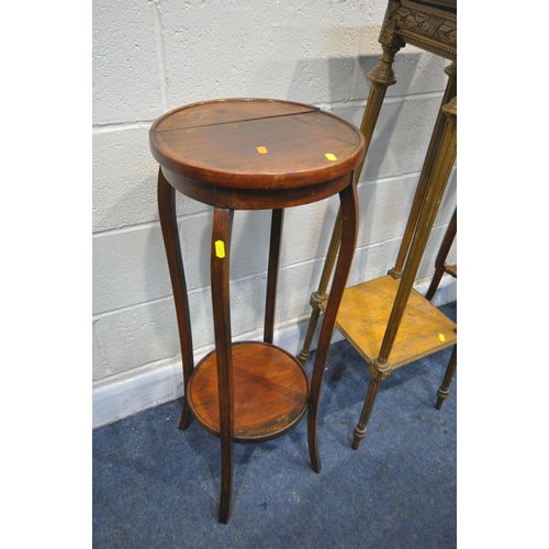 1297 - AN EARLY 20TH CENTURY OAK JARDINAIRE STAND, with a tile insert, pierced and foliate carving, on shap... 