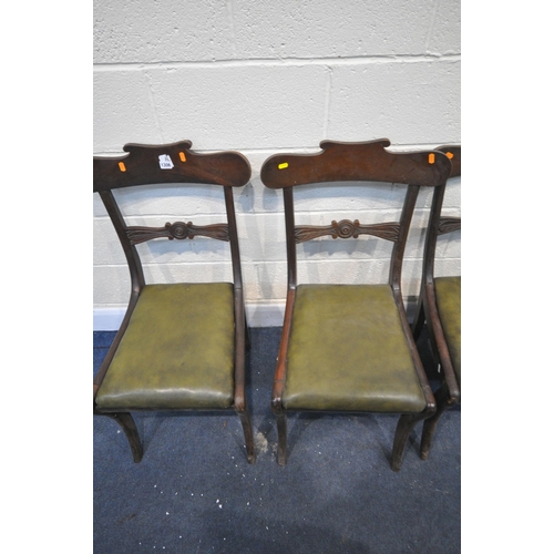 1306 - A SET OF FOUR REGENCY MAHOGANY BAR BACK CHAIRS, with olive green leather seat pads, on sabre legs (c... 