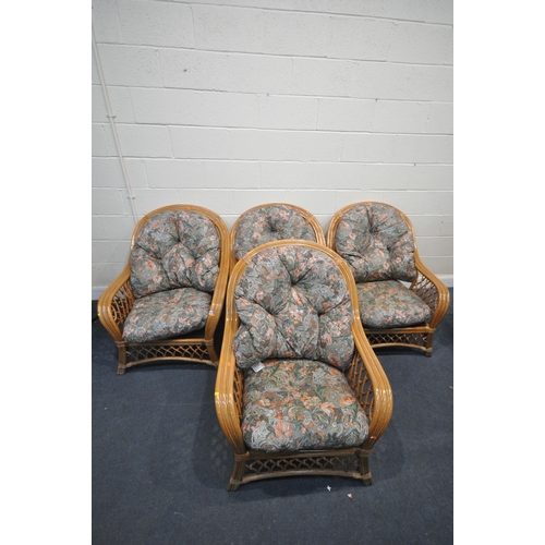 1320 - FOUR WICKER CONSERVATORY ARMCHAIRS, with floral upholstered cushions (4)