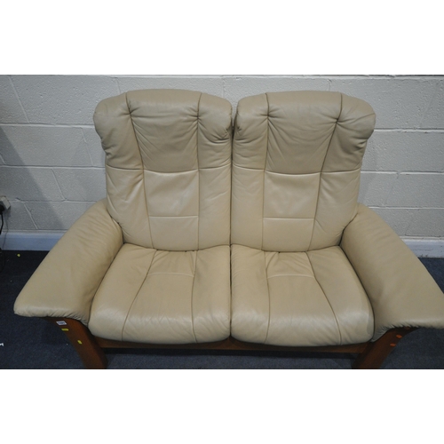 1321 - A CREAM LEATHER EKORNES STRESSLESS TWO SEATER RECLINING SOFA, length 150cm x depth 80cm x height 102... 