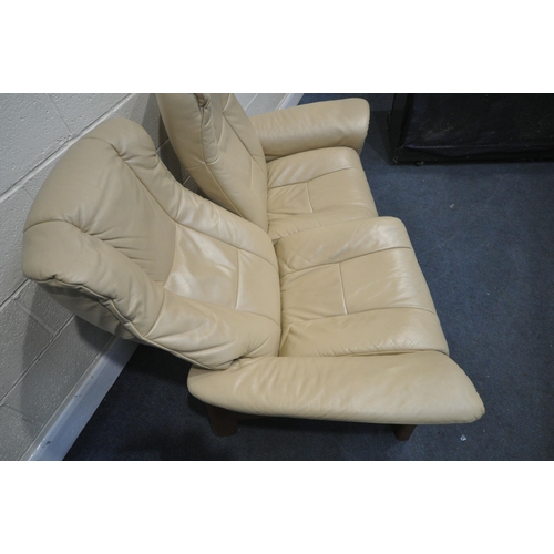 1321 - A CREAM LEATHER EKORNES STRESSLESS TWO SEATER RECLINING SOFA, length 150cm x depth 80cm x height 102... 