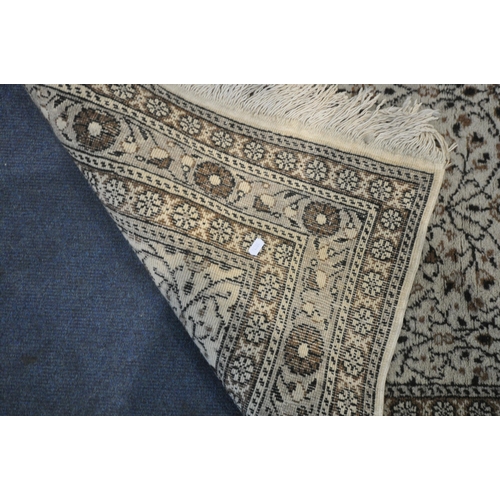 1327 - A TURKISH MILAS RUG, 220cm x 122cm (dirty and discoloured) a late 20th century woollen rug 126cm x 9... 