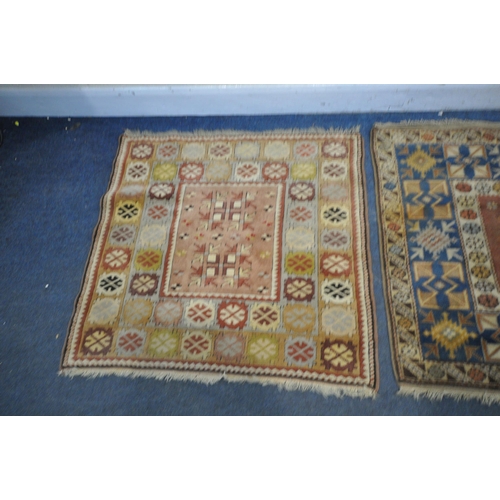 1327 - A TURKISH MILAS RUG, 220cm x 122cm (dirty and discoloured) a late 20th century woollen rug 126cm x 9... 