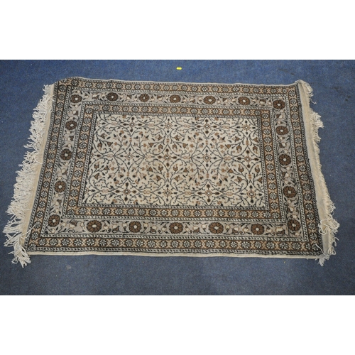 1327 - A TURKISH MILAS RUG, 220cm x 122cm (dirty and discoloured) a late 20th century woollen rug 126cm x 9... 