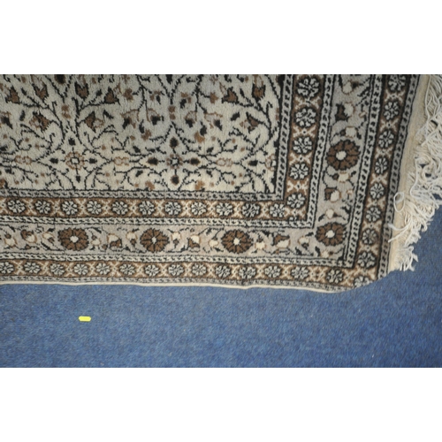 1327 - A TURKISH MILAS RUG, 220cm x 122cm (dirty and discoloured) a late 20th century woollen rug 126cm x 9... 