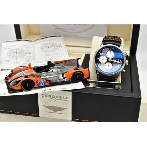 107 - A RAIDILLON 'CONQUEST ENDURANCE' DAY DATE WRISTWATCH WITH PRESENTATION BOX, the watch with black dia... 