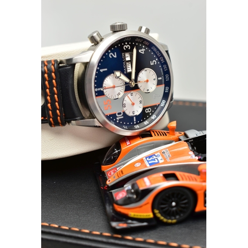 107 - A RAIDILLON 'CONQUEST ENDURANCE' DAY DATE WRISTWATCH WITH PRESENTATION BOX, the watch with black dia... 