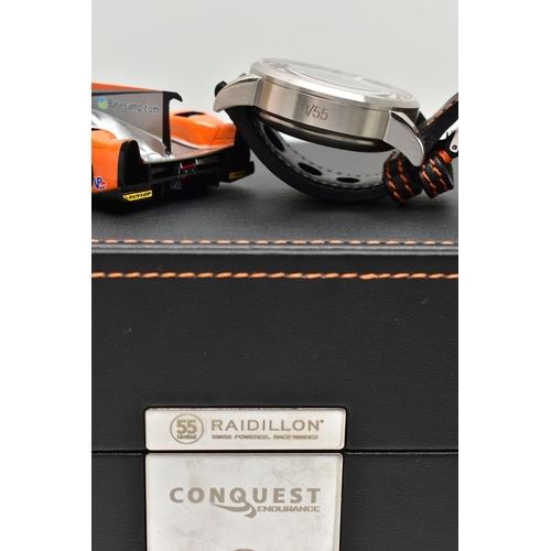 107 - A RAIDILLON 'CONQUEST ENDURANCE' DAY DATE WRISTWATCH WITH PRESENTATION BOX, the watch with black dia... 