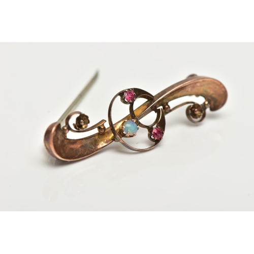 11 - A 9CT GOLD OPAL AND RUBY BROOCH, openwork crescent to the centre set with an opal cabochon and two g... 