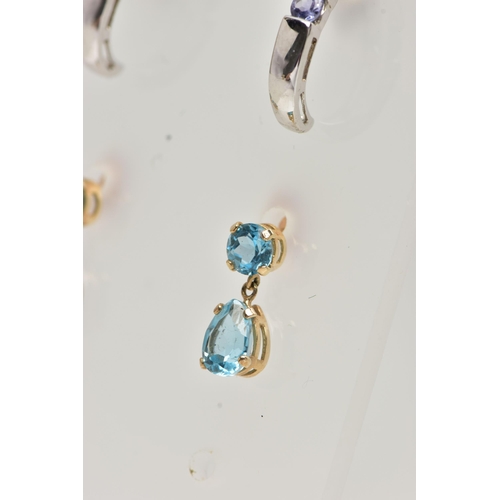 12 - TWO PAIRS OF GEM SET EARRINGS, the first a pair of curved drop earrings each set with a circular cut... 