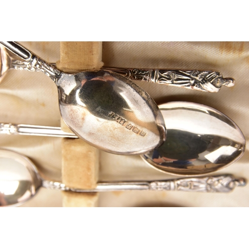 151 - AN INCOMPLETE SET OF GEORGE V APOSTLE TOP TEASPOONS, ANOTHER SILVER TEASPOON AND A SILVER NAPKIN RIN... 