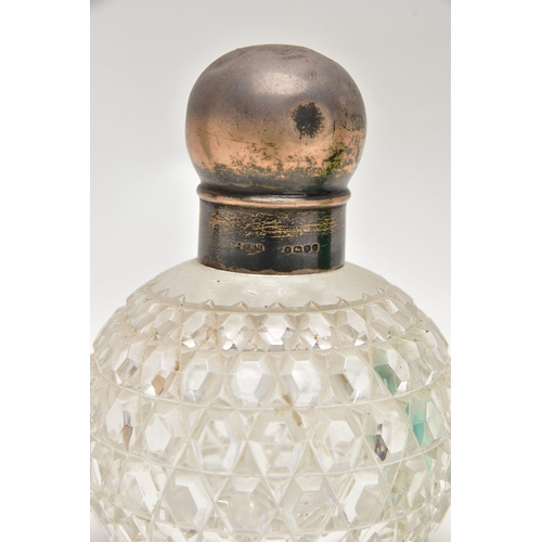 152 - A GROUP OF 19TH AND EARLY 20TH CENTURY SILVER AND WHITE METAL MOUNTED SCENT BOTTLES AND TOILET JARS ... 