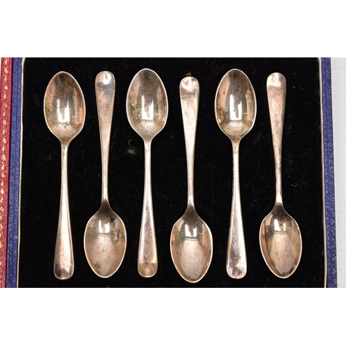 172 - TWO CASED SETS OF SIX SILVER COFFEE SPOONS AND A CASED SET OF FOUR ELIZABETH II 'BRITISH HALLMARK' L... 