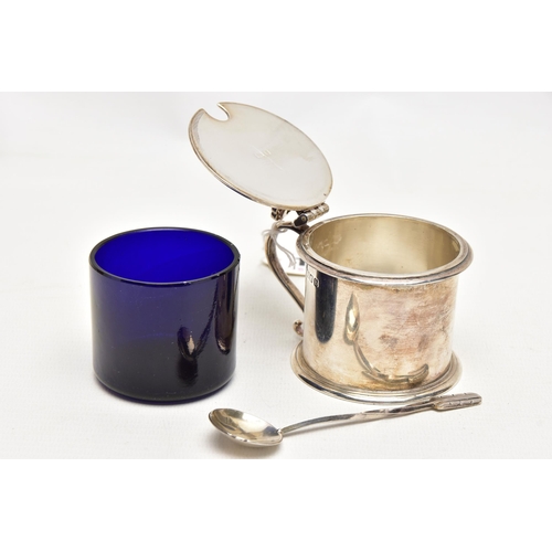 176 - A MID 20TH CENTURY SILVER MUSTARD, polished design, fitted with a scroll handle and a shell shape fi... 