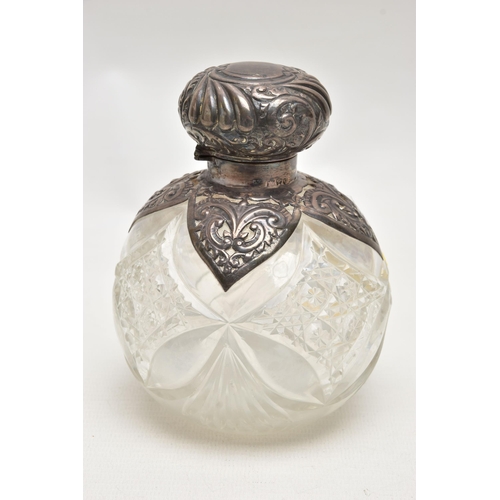 183 - A LATE VICTORIAN SCENT BOTTLE, round glass bottle, fitted with a silver domed cover detailed with a ... 