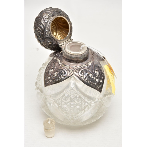 183 - A LATE VICTORIAN SCENT BOTTLE, round glass bottle, fitted with a silver domed cover detailed with a ... 