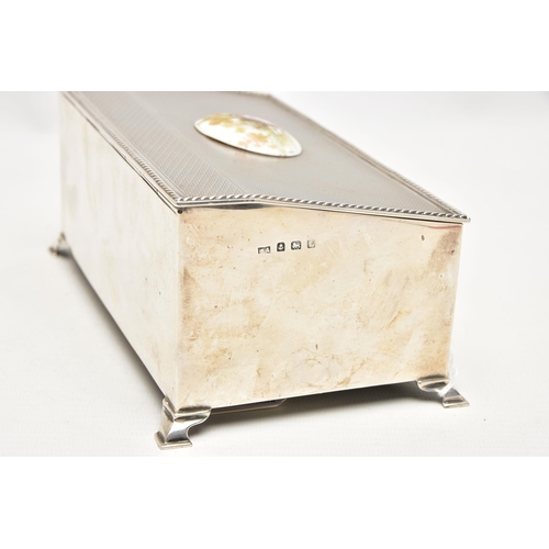 185 - AN EARLY 20TH CENTURY SILVER BOX, of a rectangular form, engine turned pattern, hinged cover fitted ... 