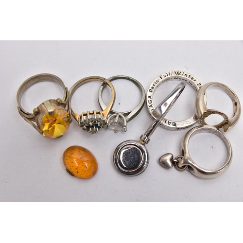 30 - A SILVER MASONIC NAPKIN HOLDER, SIX RINGS AND A LOOSE AMBER CABOCHON, the polished napkin holder eng... 