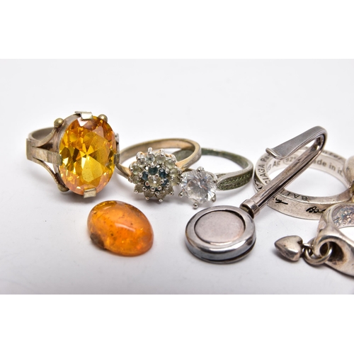 30 - A SILVER MASONIC NAPKIN HOLDER, SIX RINGS AND A LOOSE AMBER CABOCHON, the polished napkin holder eng... 