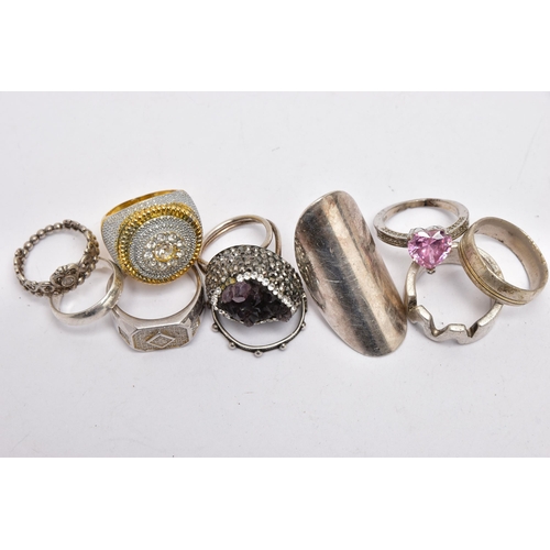 39 - A BAG OF ASSORTED RINGS, ten rings in total, a large yellow metal dress ring set with paste, stamped... 